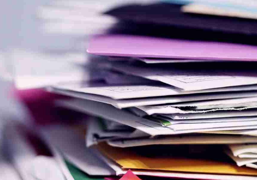 paperwork in a pile needs organizing systems