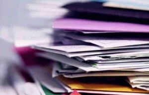 paperwork in a pile needs organizing systems