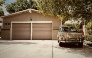 car in front of garage to organize