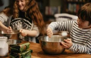 family cooking and having fun in organized kitchen