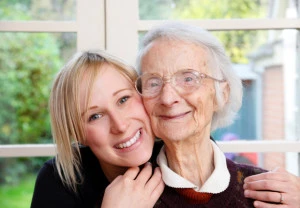a happy woman hugs her Mom