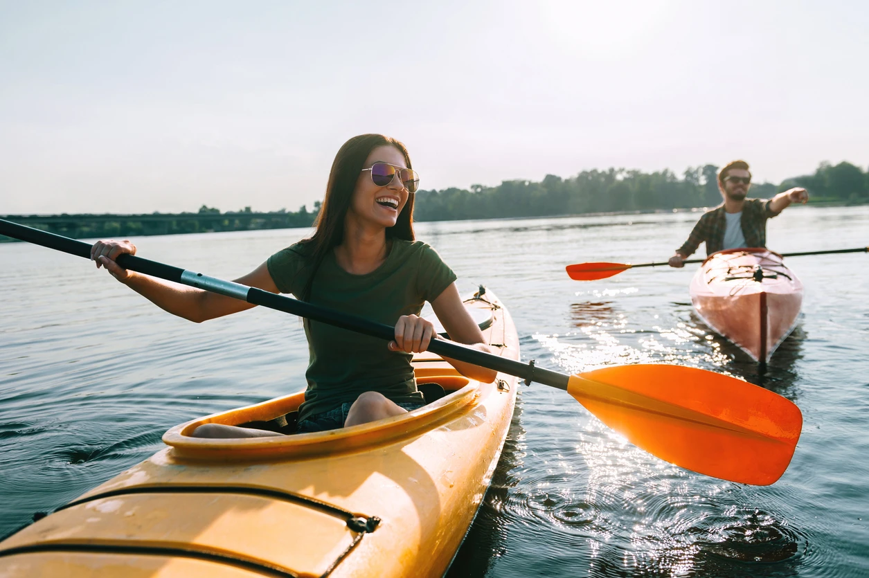 Couple having fun kayaking 