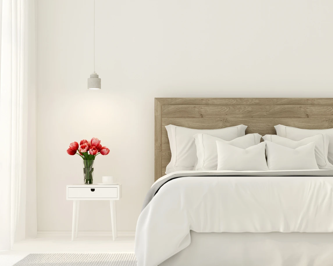 Minimal bedroom with white linens 