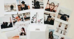 photos laid out next to a digital photo scanner