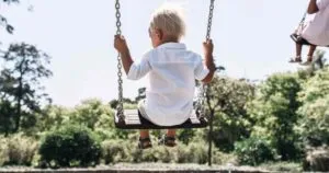 child on swing at home feeling peaceful, Home Organization Tips for busy parents