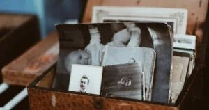 sentimental keepsakes, old photos in a keepsake box