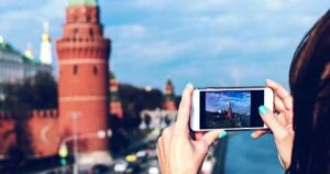 woman taking photo while on vacation