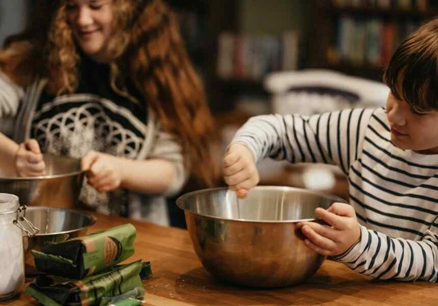 family cooking and having fun in organized kitchen