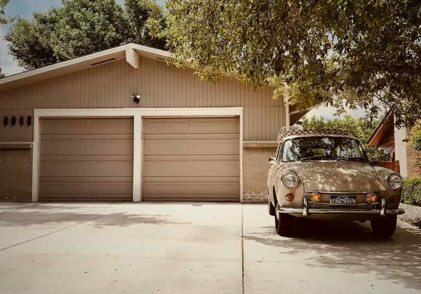 car in front of garage to organize