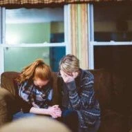two grieving family members getting help organizing