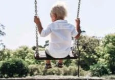 peaceful-at-home-child-swinging child on swing at home feeling peaceful, Home Organization Tips for busy parents