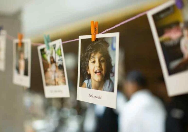 sentimental photos on a memory garland